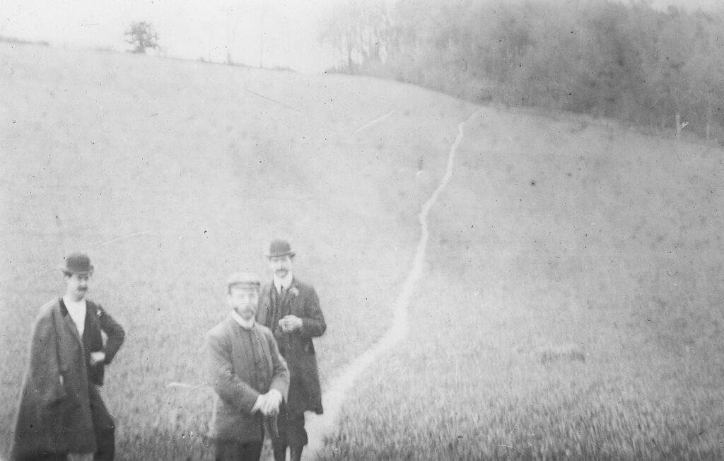 M85 Three men on Path to long plantation